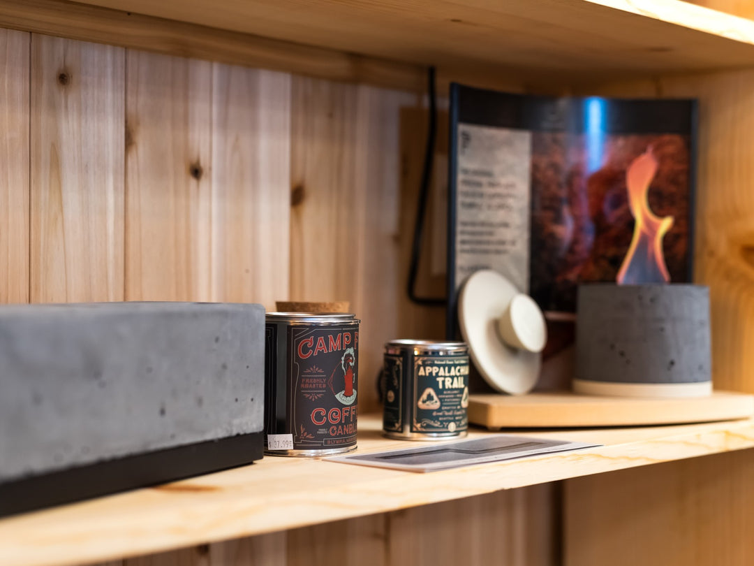 an assortment of candles and personal fireplaces